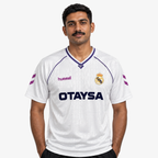Real Madrid Camisola Principal - 90/91 — hero editorial com modelo IA